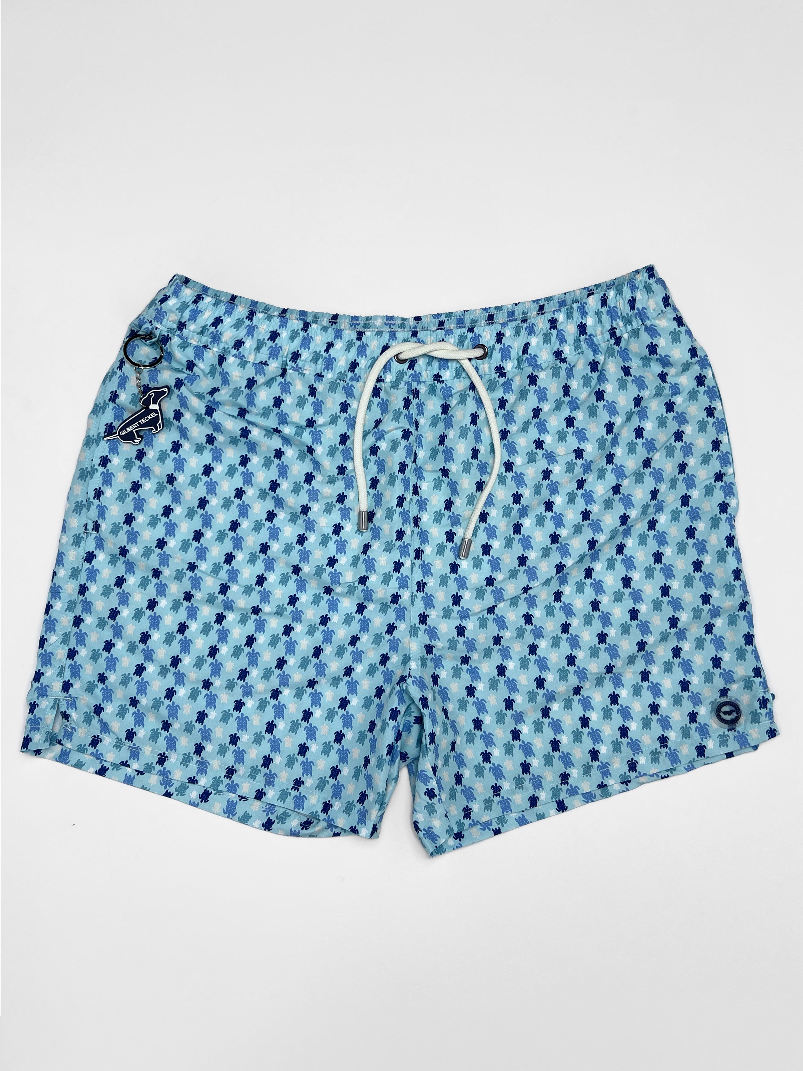 Gilbert Teckel, Micro Turtle Print Swim Shorts – Light Blue