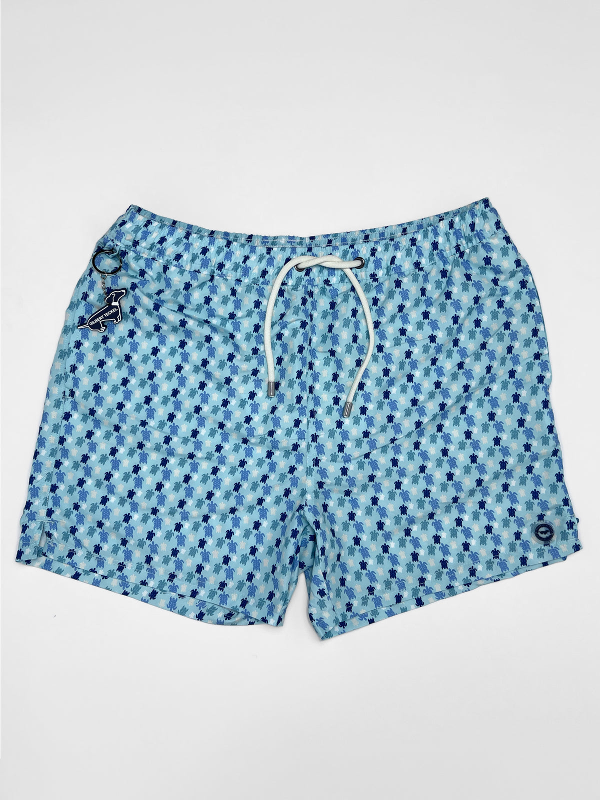 Gilbert Teckel, Micro Turtle Print Swim Shorts – Light Blue